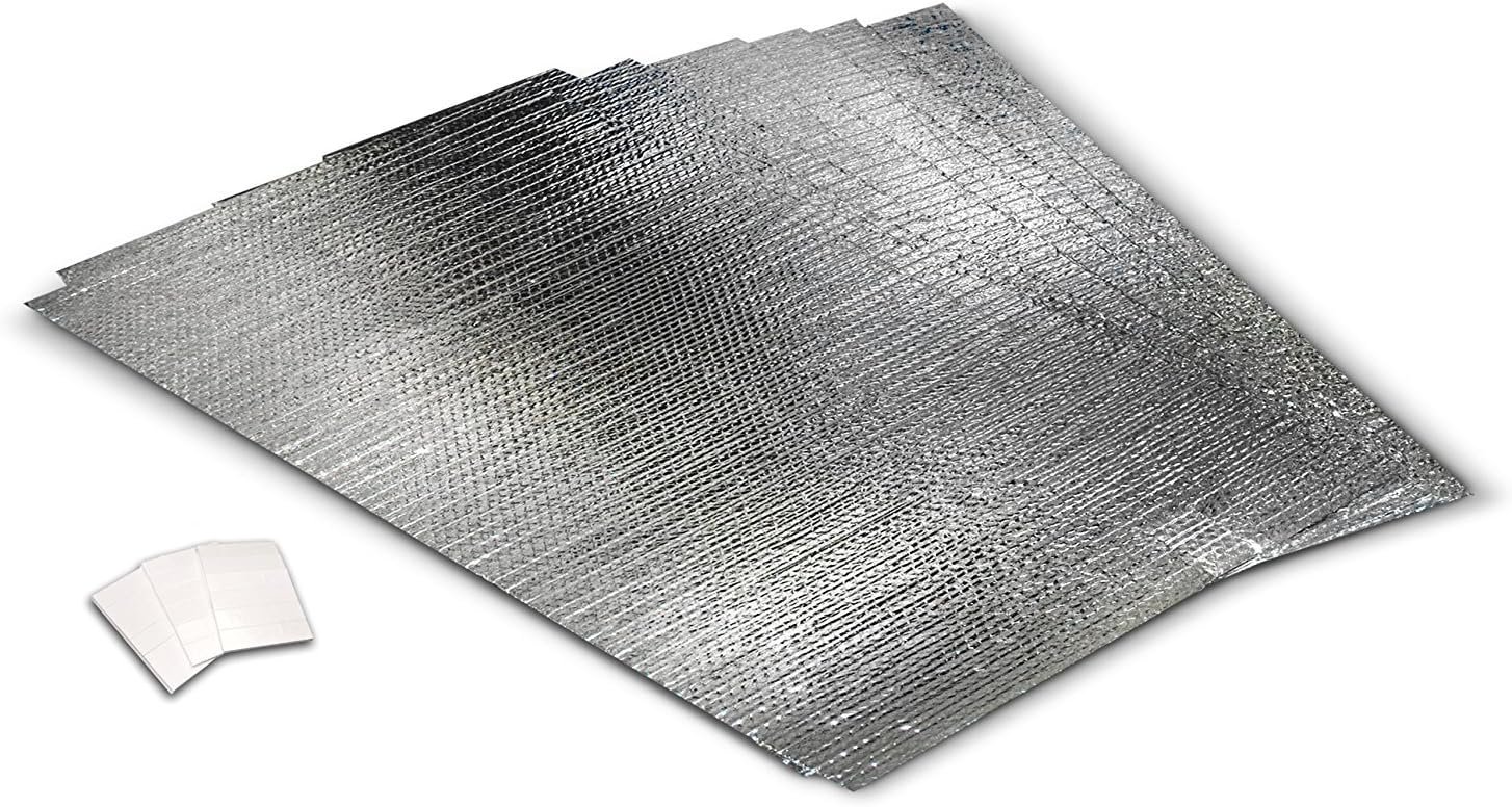 Reach Barrier 3009 reflective insulation panels installed on a sectional garage door